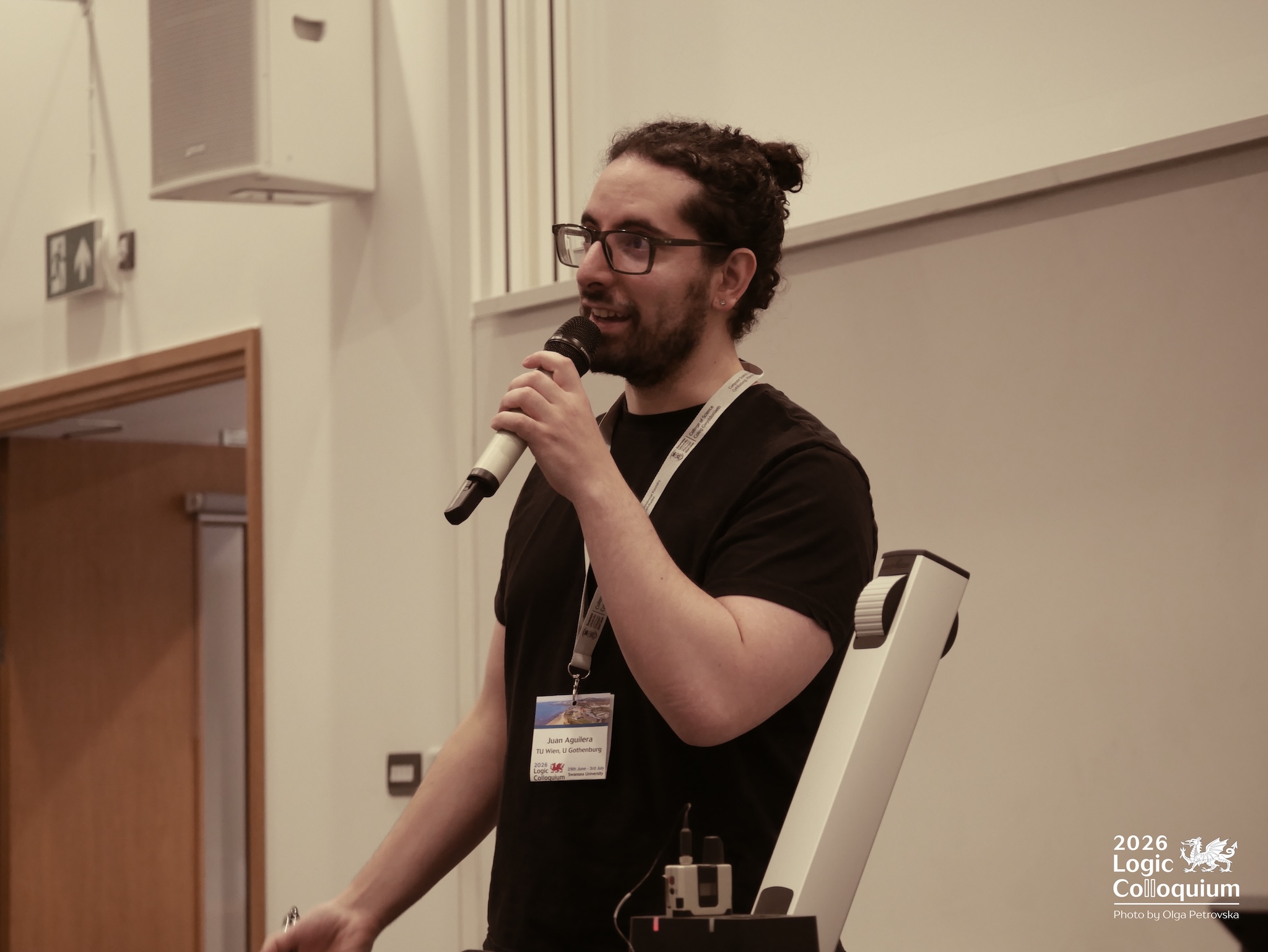 Photograph of a tutorial speaker holding an ice cream