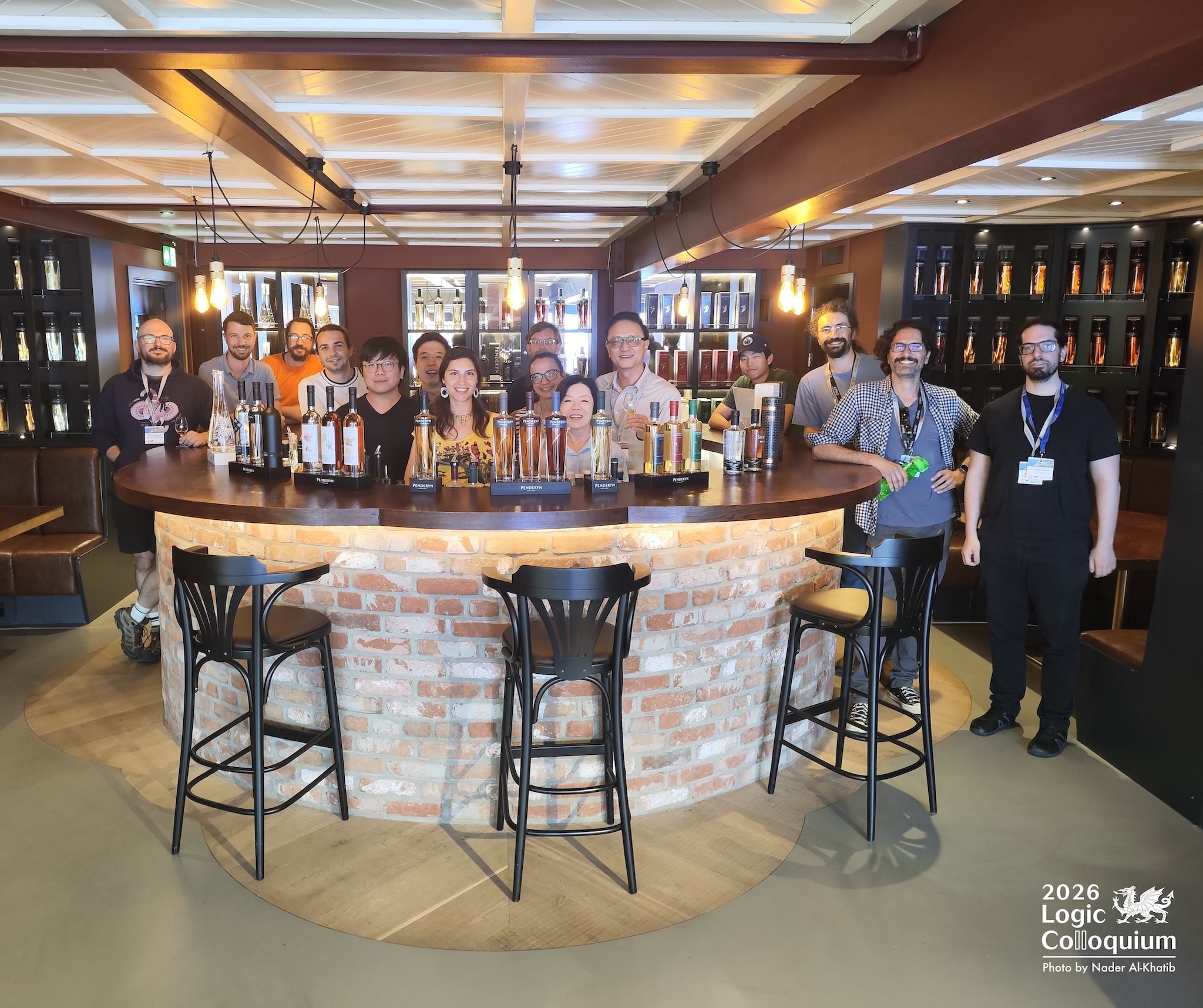 photograph of approximately ten LC2026 enthusiasts posing inside the whisky tasting room.
